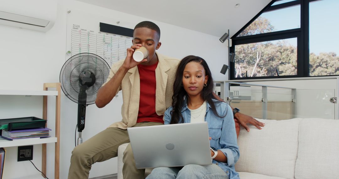 Coworkers Collaborating in Casual Home Office Environment