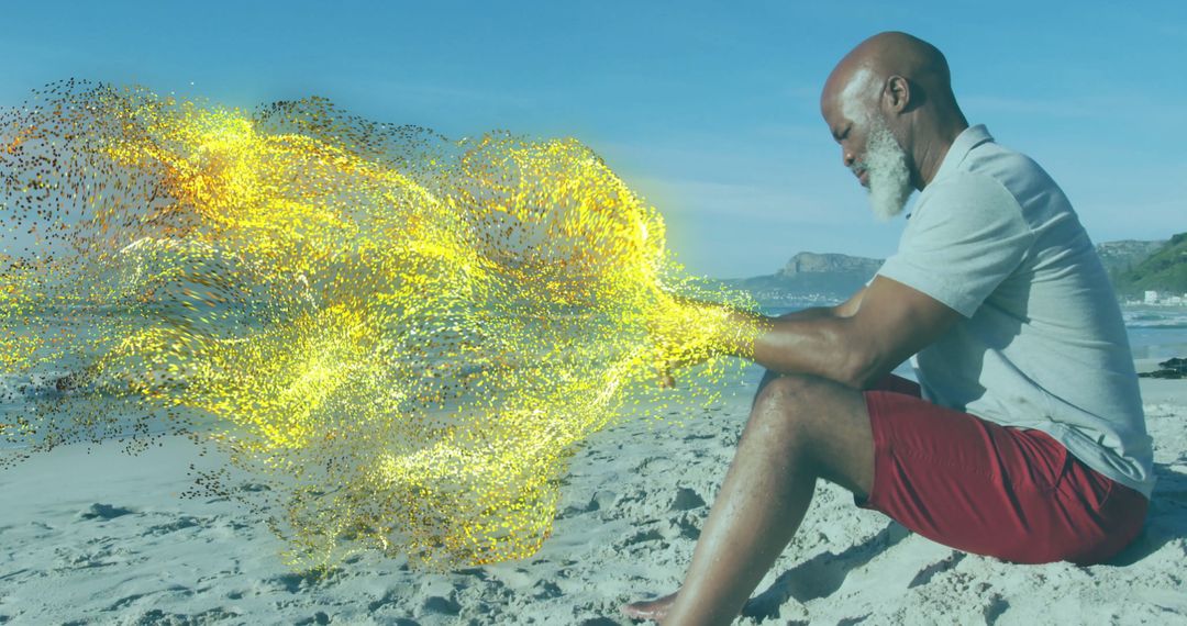 Man Creating Golden Digital Swirl by Ocean on Sandy Beach