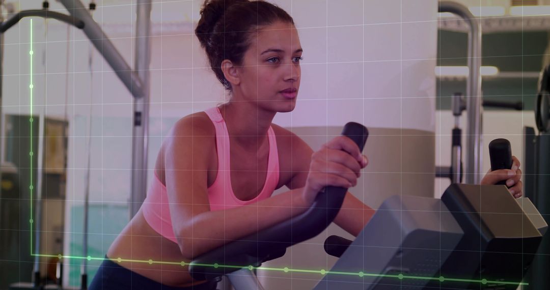 Woman Exercising on Stationary Bike with Performance Metrics
