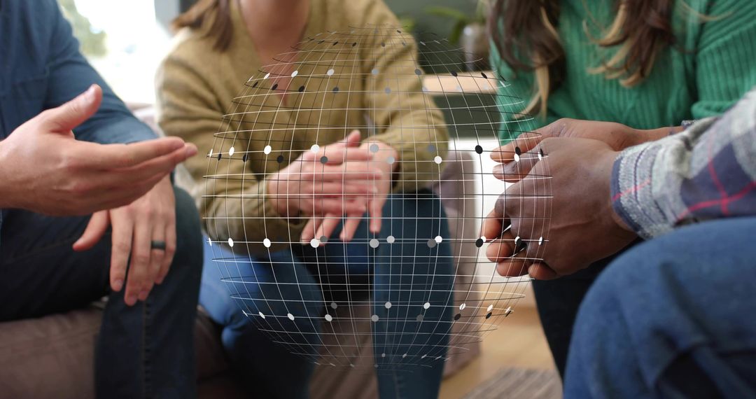 Casual group brainstorming with wireframe globe hologram for collaborative AR discussion