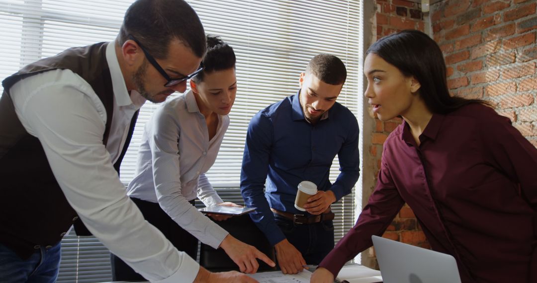 Collaborative Business Team Engaging in Strategic Discussion