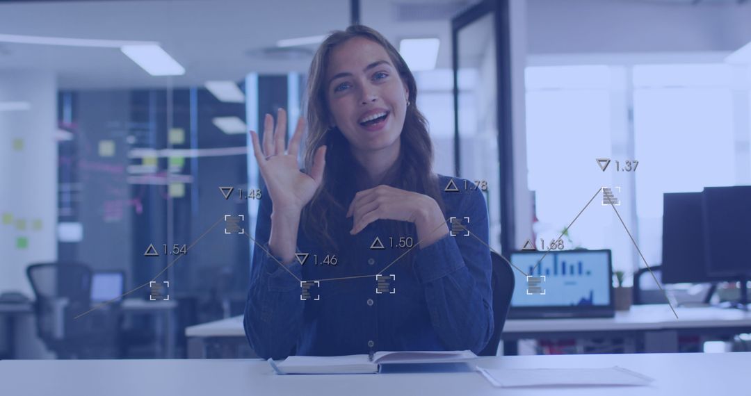 Woman in Modern Office with Virtual Business Data Interface