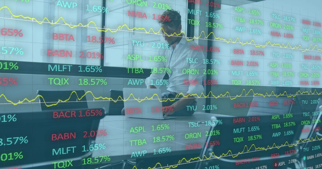 Caucasian Businessman Analyzing Financial Data with Laptop in Office