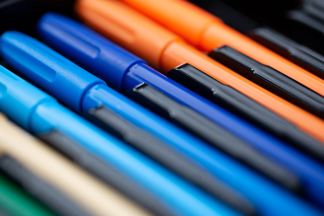 Colorful Assortment of Pens in a Close-up View
