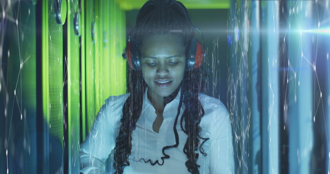 Female IT Professional Analyzing Data in Modern Server Room