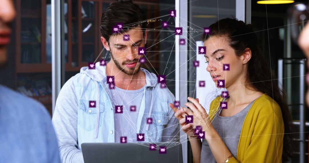 Young Professionals Collaborating with Digital Network