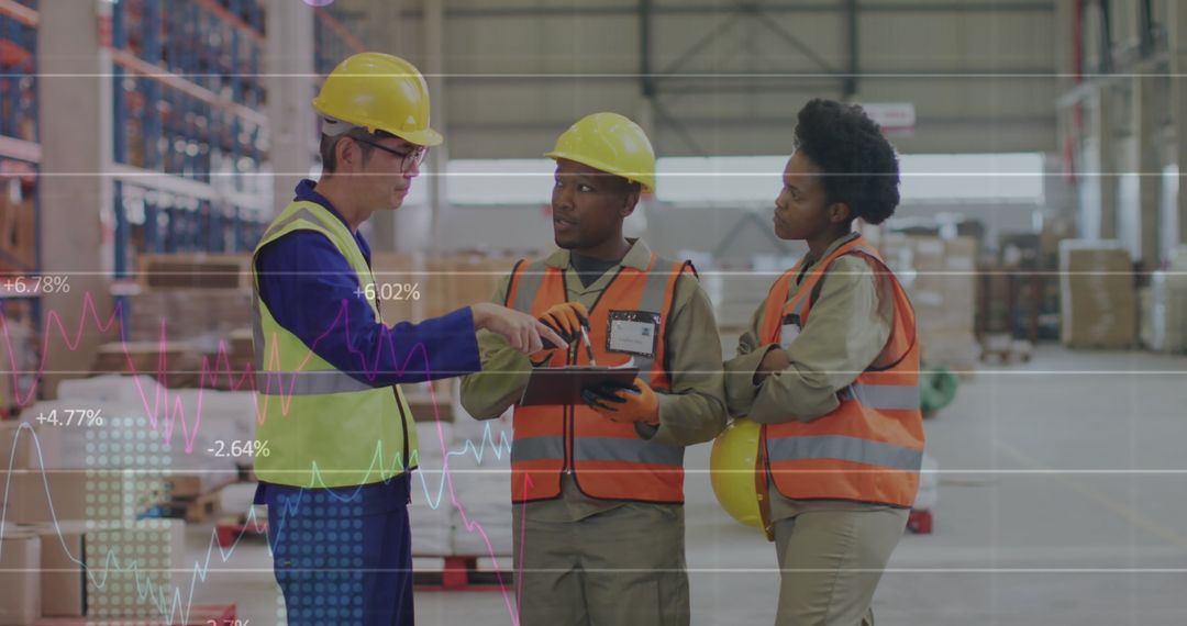 Warehouse Workers Analyzing Digital Supply Chain Data Visualizations