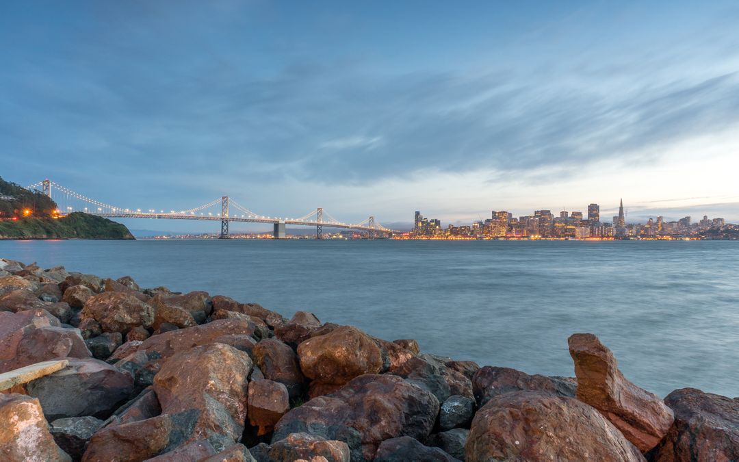 San Francisco Bay Bridge and City Skyline at Dusk - Free Images, Stock Photos and Pictures on Pikwizard.com