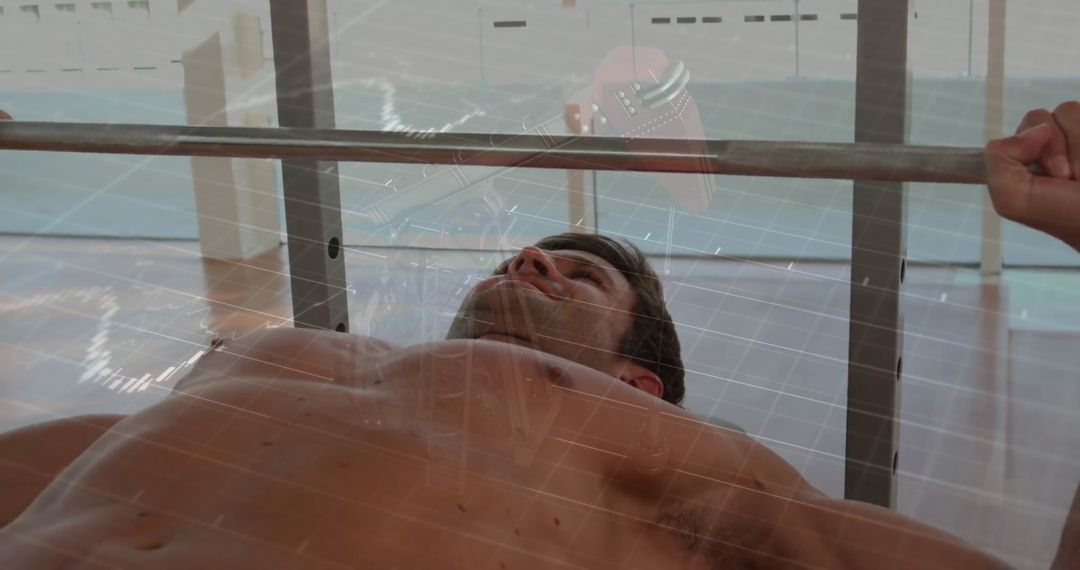 Athlete Bench Pressing in Gym with Modern Architecture