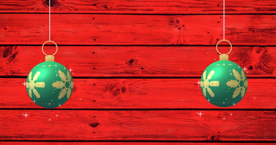 Festive Green Christmas Baubles with Snowflake Design on Red Wooden Background