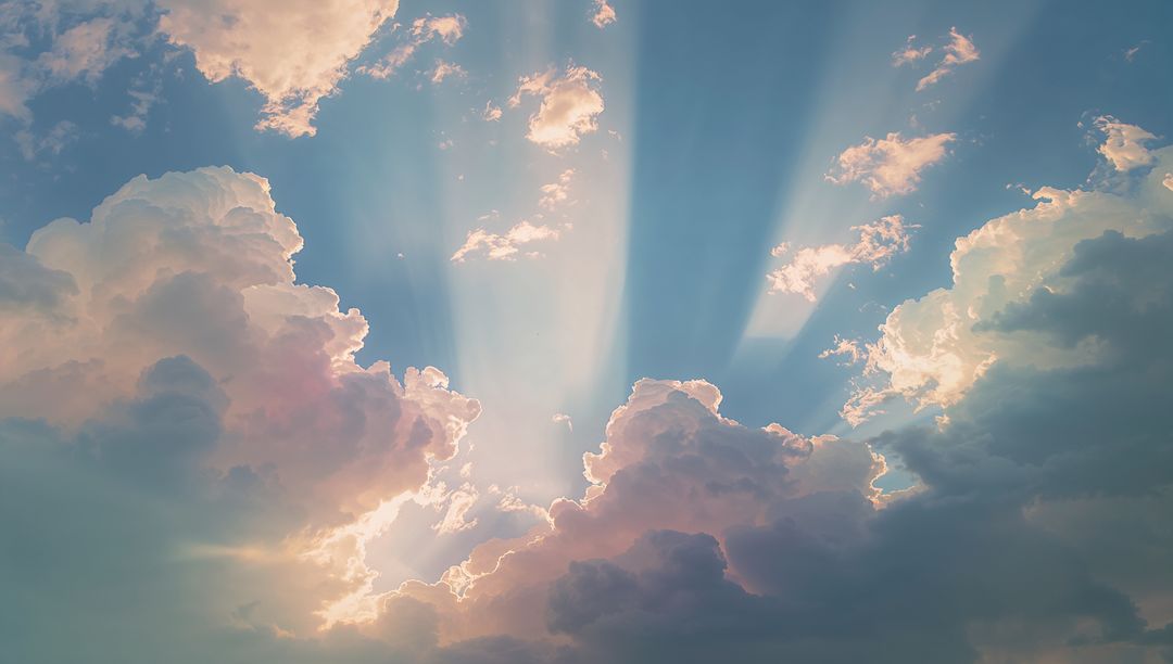 Sun Ray Streaming Cumulus Clouds with Pastel Sky