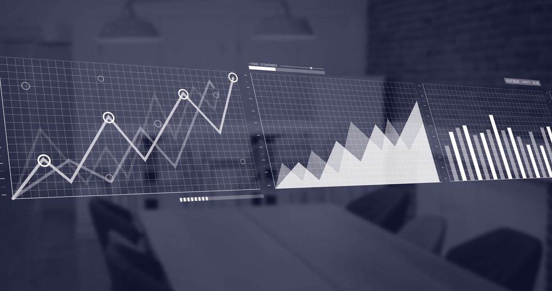 Financial Data and Charts Displayed Over Modern Office Table