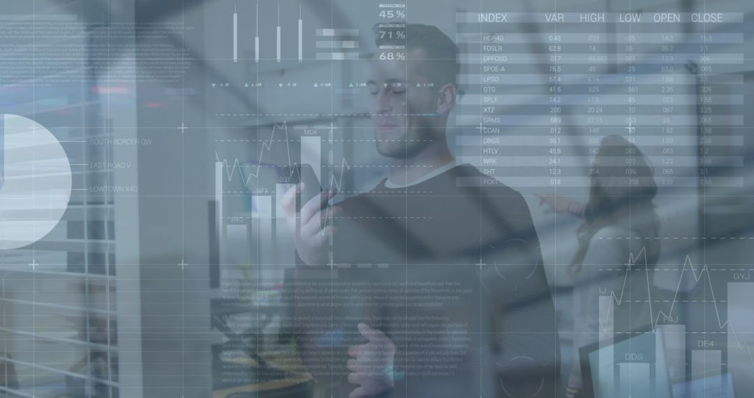 Young Professionals Analyzing Data with Digital Graphs in Modern Office