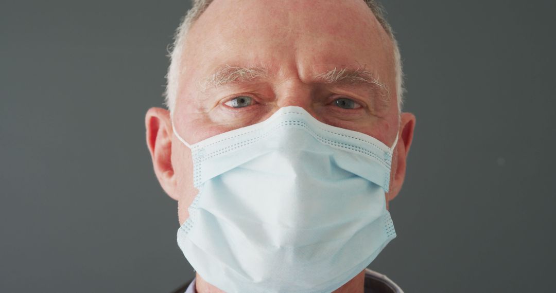 Elderly Man Wearing Medical Face Mask Pandemic Protection - Free Images, Stock Photos and Pictures on Pikwizard.com