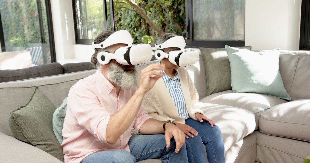 Seniors Experiencing Virtual Reality with Advanced VR Headsets Indoors