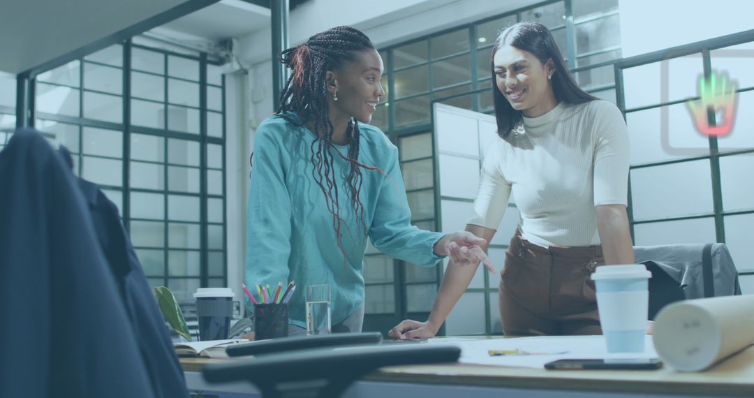 Female Architects Collaborating on Project at Modern Workspace