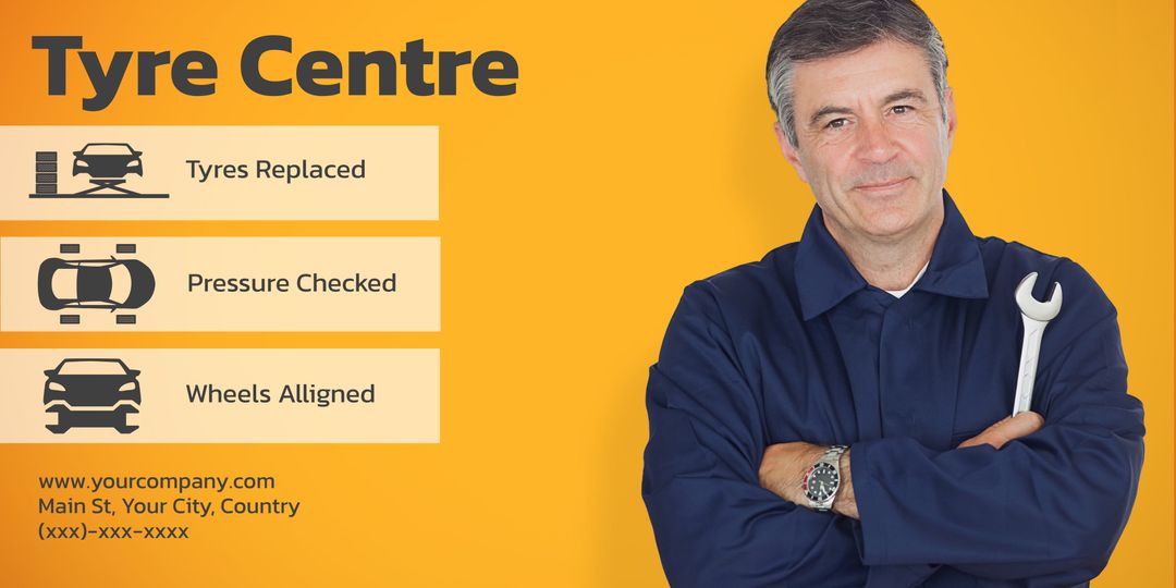 Confident Mechanic Holding Wrench Against Yellow Background