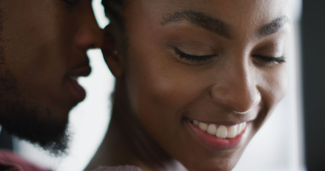 Close-Up of Smiling Woman with Partner Whispering - Free Images, Stock Photos and Pictures on Pikwizard.com