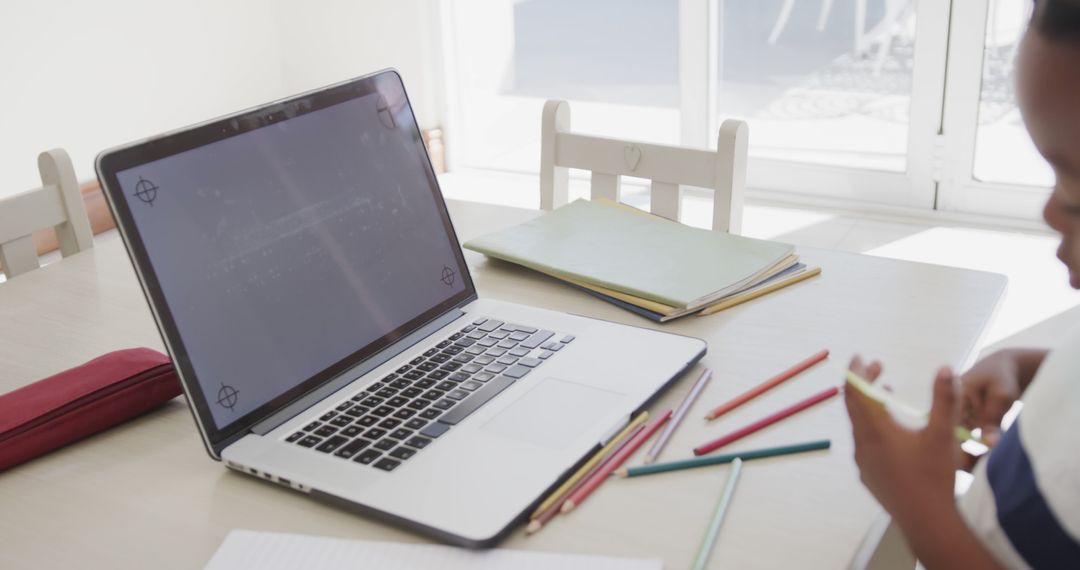 Child Engaging in Online Learning at Home