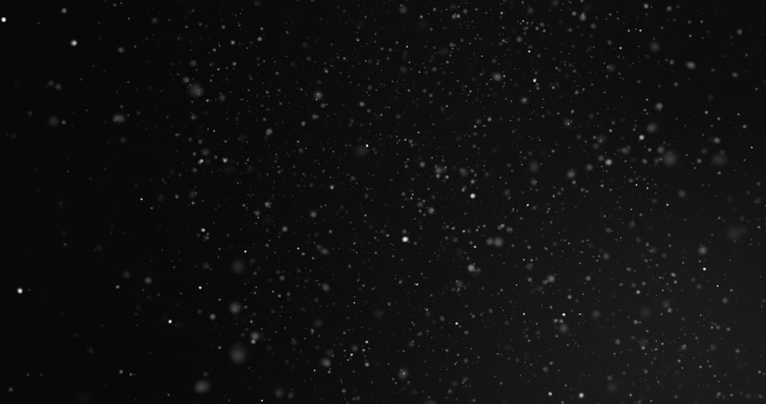 White Particles Floating on Black Background, Explores Light and Movement