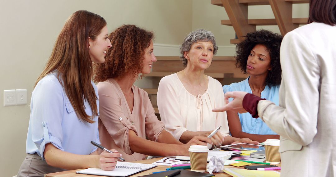 Team of Diverse Women Brainstorming Together in Modern Office - Free Images, Stock Photos and Pictures on Pikwizard.com