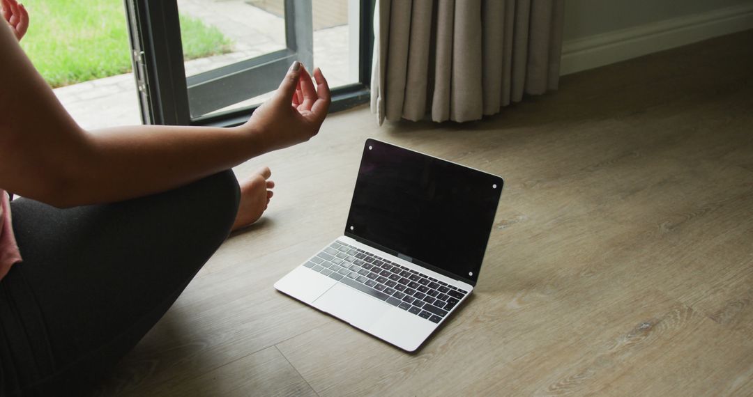 Woman Practicing Yoga Meditation with Laptop at Home - Free Images, Stock Photos and Pictures on Pikwizard.com