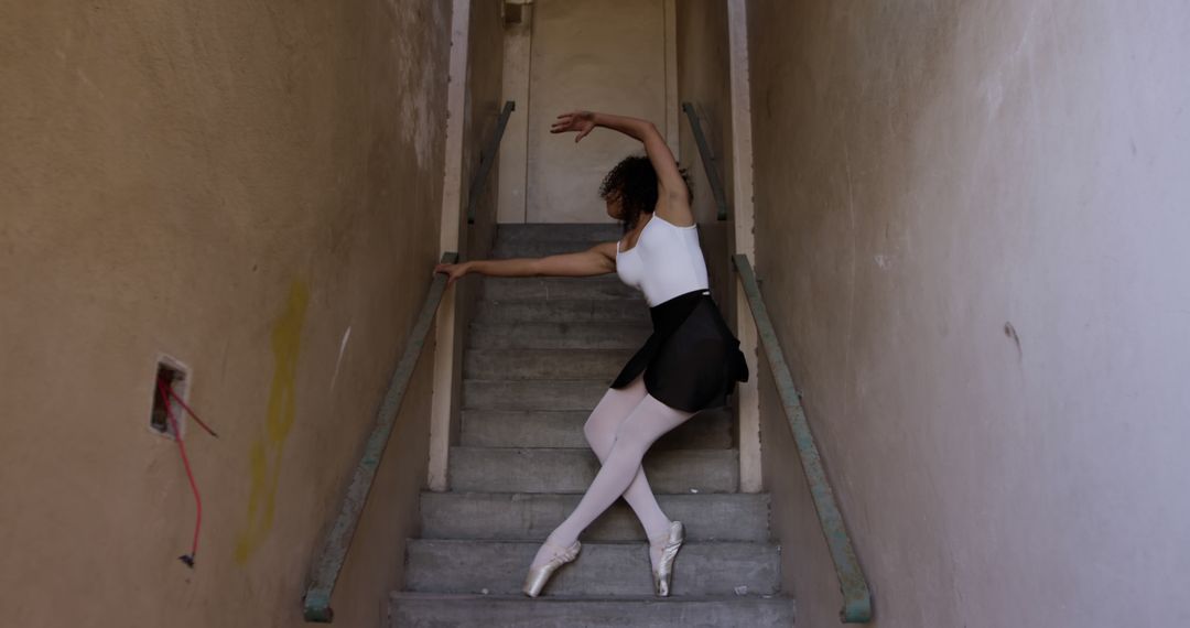 Ballet Dancer Practicing on Staircase - Free Images, Stock Photos and Pictures on Pikwizard.com