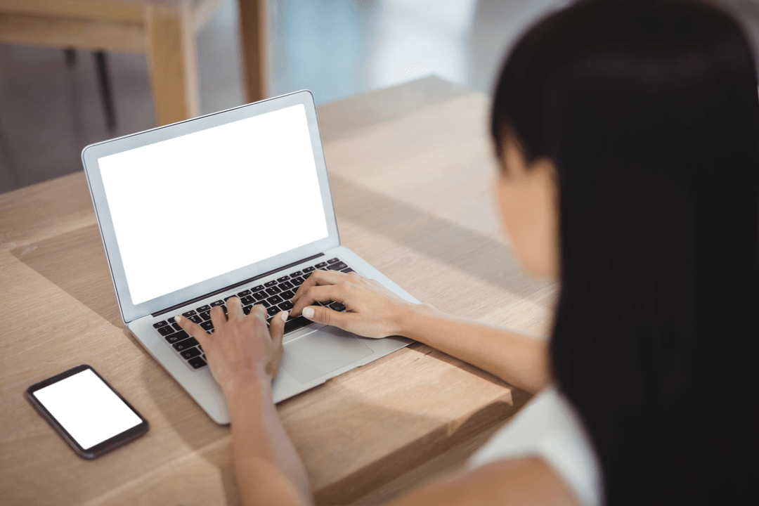 Transparent Screen on Laptop with Woman at Desk Working