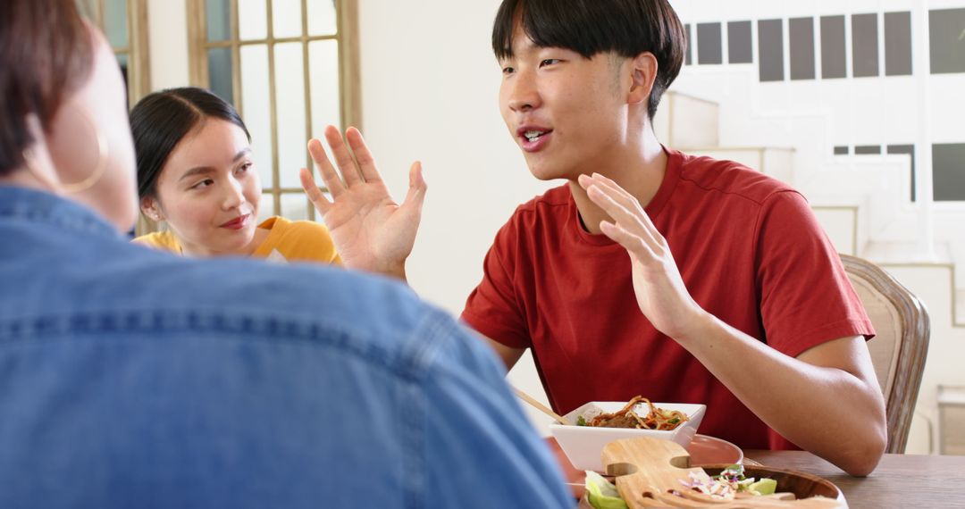 Cultural Work Teams Discussing Creative Ideas Over Lunch