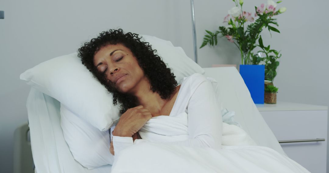 Woman Resting Peacefully in Hospital Bed - Free Images, Stock Photos and Pictures on Pikwizard.com