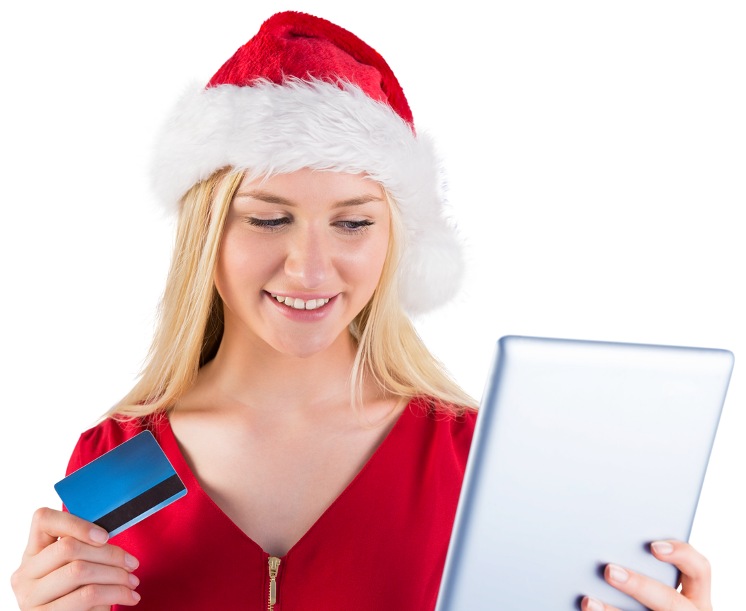 Festive woman with Santa hat using tablet for online shopping - Download Free Stock Images Pikwizard.com