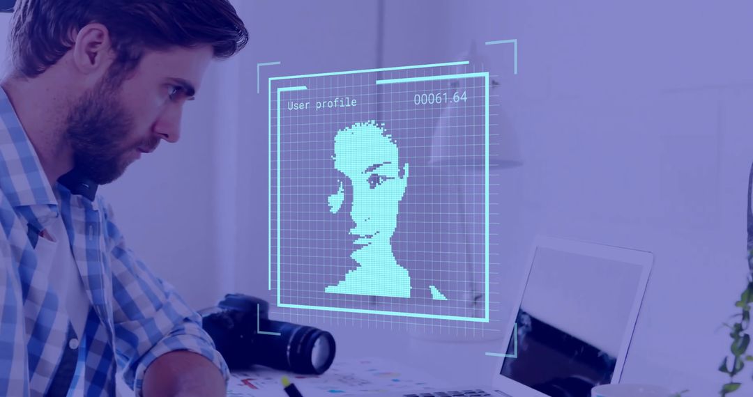 Businessman Analyzing Facial Recognition Technology on Computer