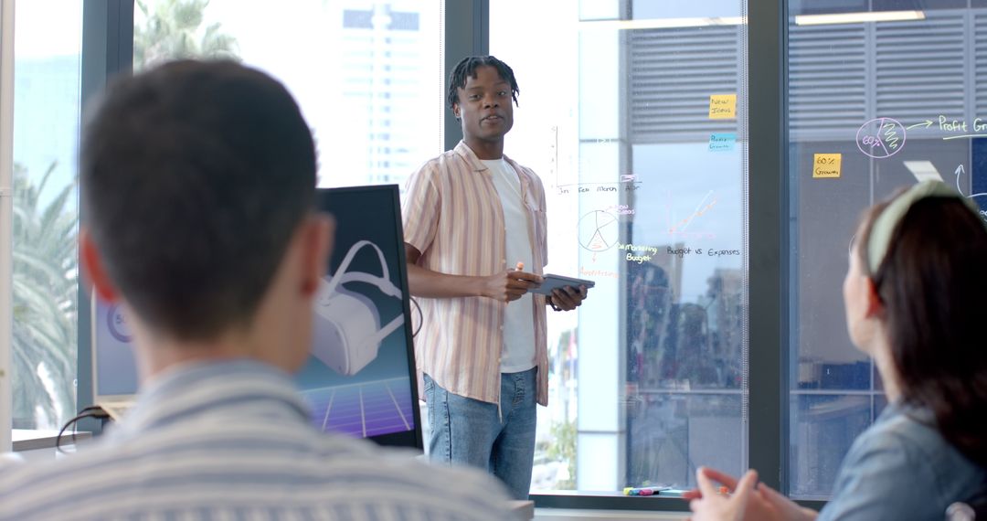 Team Collaborating on Virtual Reality Project in Modern Office