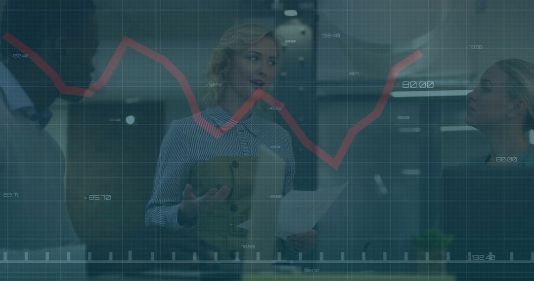 Business Professionals Discussing Data Analysis with Red Line Graph