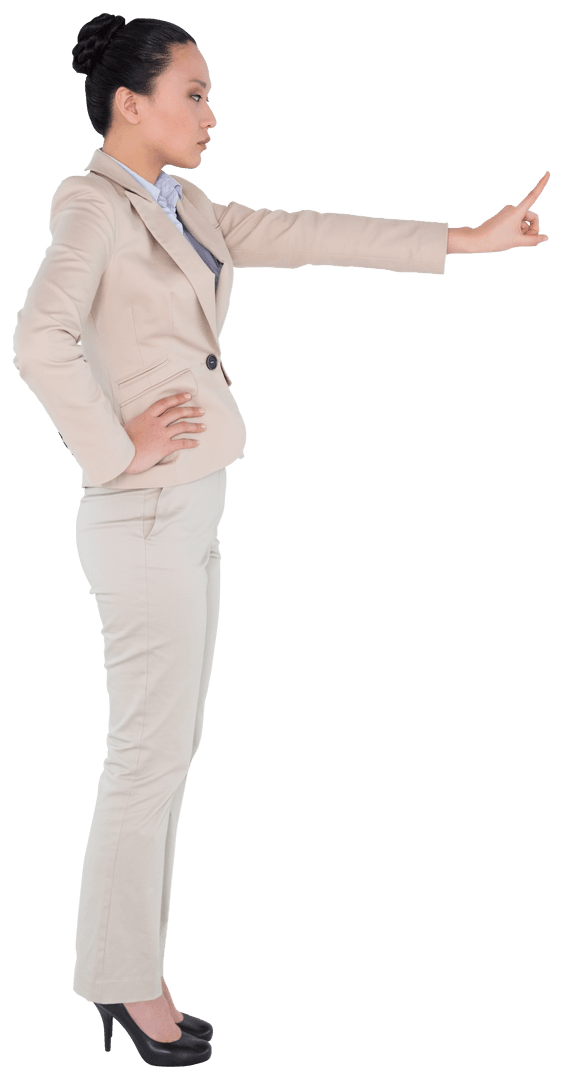 Businesswoman Pointing in Power Suit on Transparent Background
