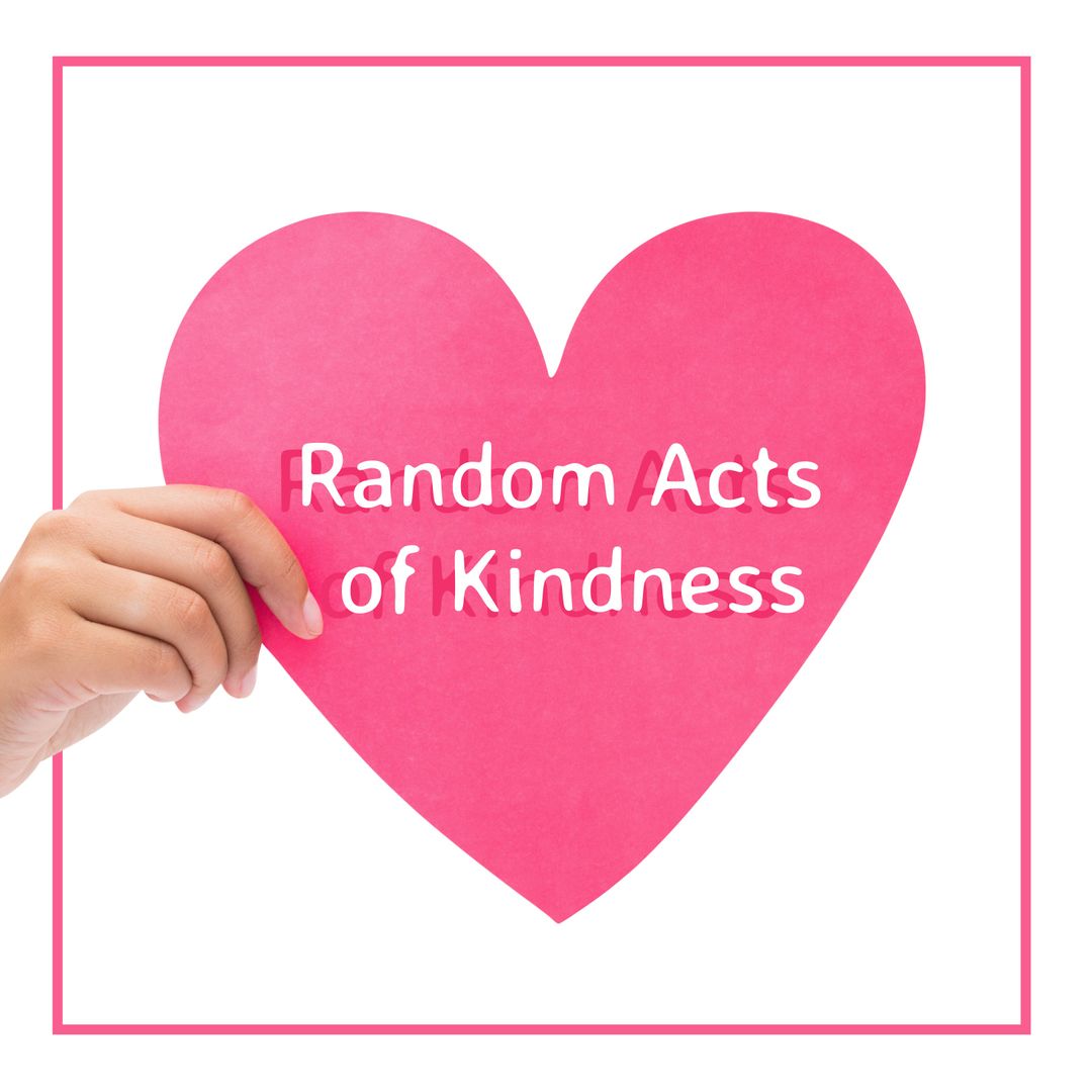 Hand Holding Pink Heart for Random Acts of Kindness Promotion