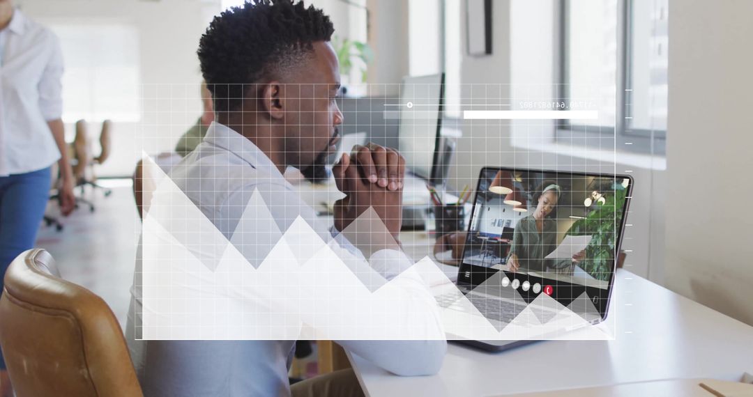 Businessman Analyzing Financial Data During Virtual Meeting