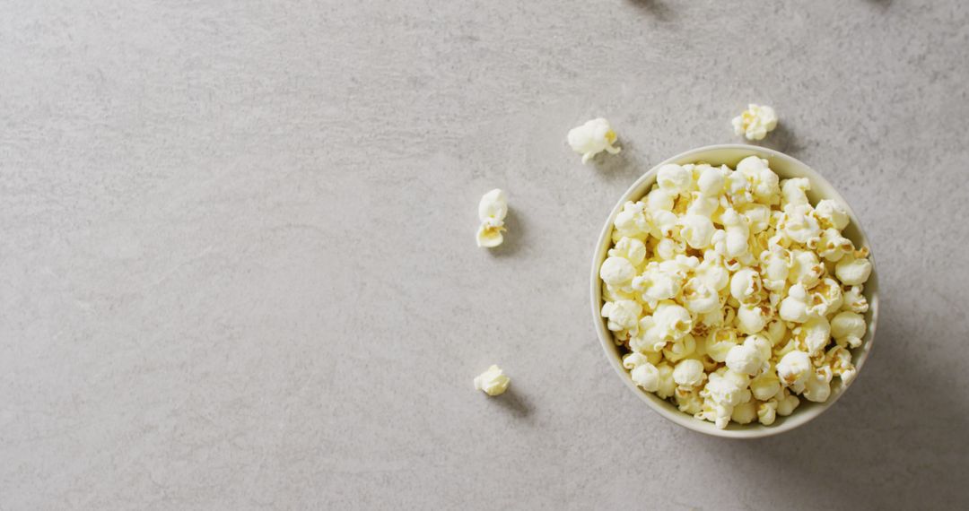 Close Up of Popcorn Bowl on Gray Surface