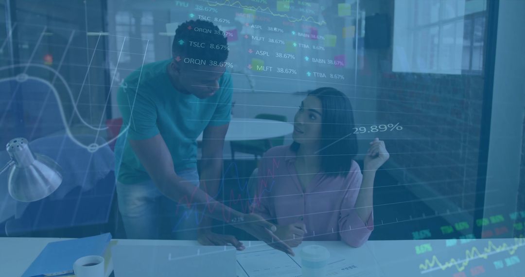 Team Meeting with Financial Data and Diverse Colleagues in Modern Office