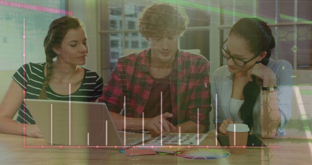 Team Collaborating on Data Analysis in Modern Tech Environment