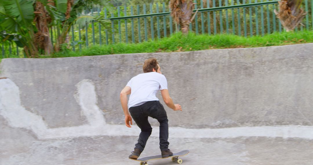 Man Skateboarding on Concrete Ramp in Urban Skate Park - Free Images, Stock Photos and Pictures on Pikwizard.com