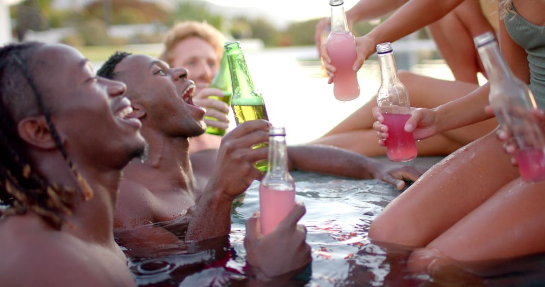 Friends Enjoying Pool Party with Colorful Drinks - Free Images, Stock Photos and Pictures on Pikwizard.com