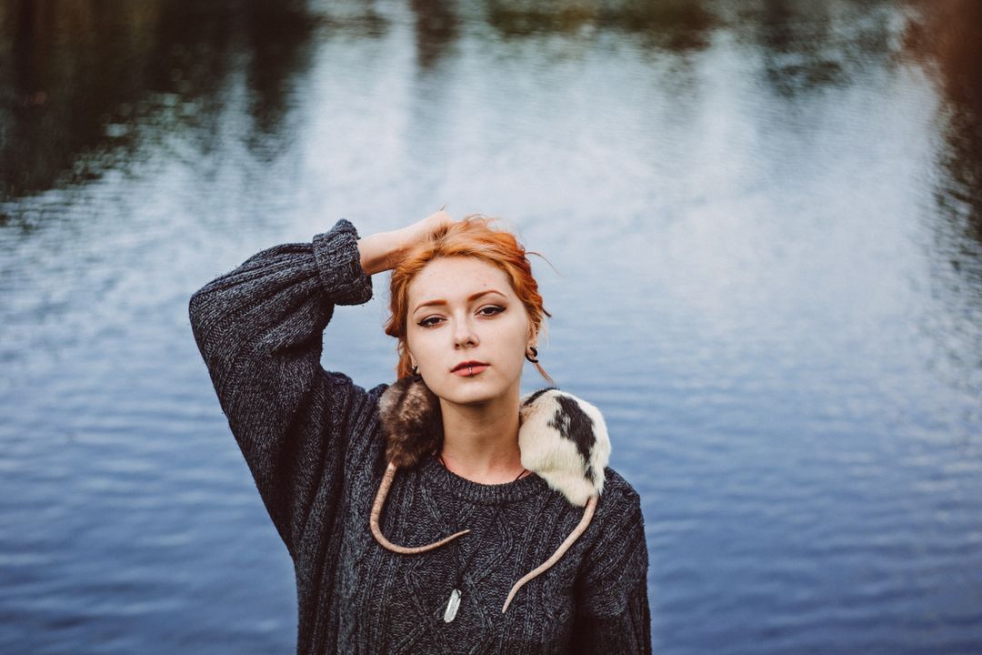 Young Woman with Pet Rat near Water - Free Images, Stock Photos and Pictures on Pikwizard.com