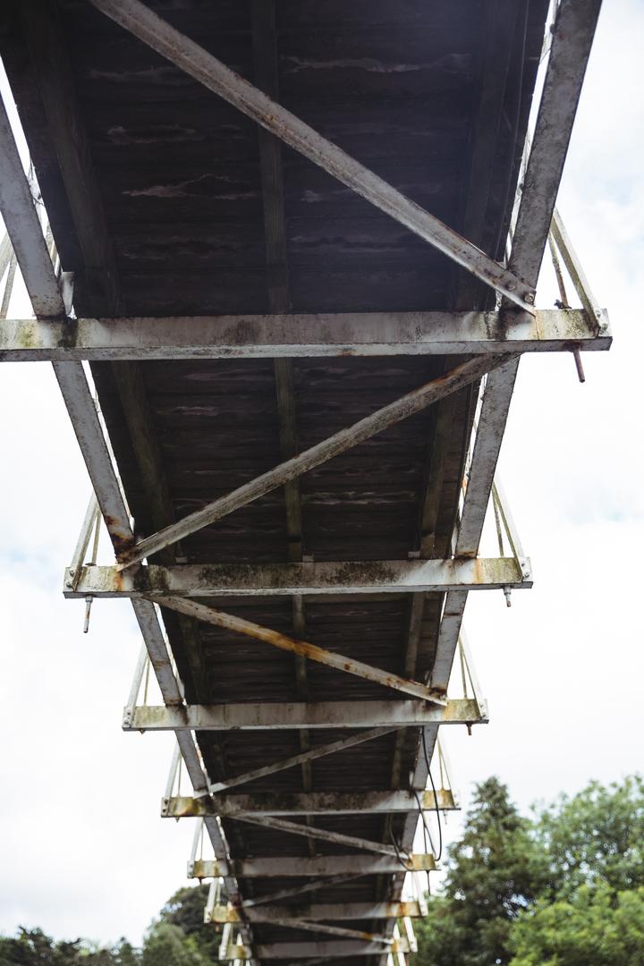 Low Angle View of Old Rusty Bridge - Free Images, Stock Photos and Pictures on Pikwizard.com