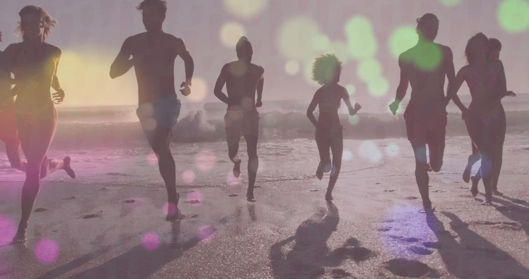 Active Beach Runners Enjoying Sunset With Ocean Waves