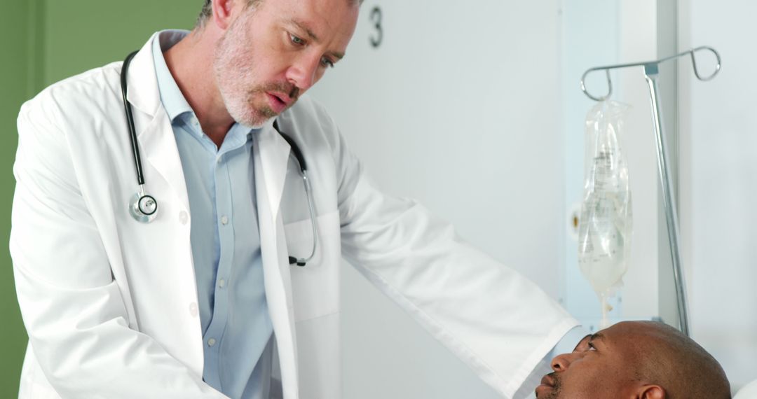 Doctor Attending to Patient in Hospital Room - Free Images, Stock Photos and Pictures on Pikwizard.com