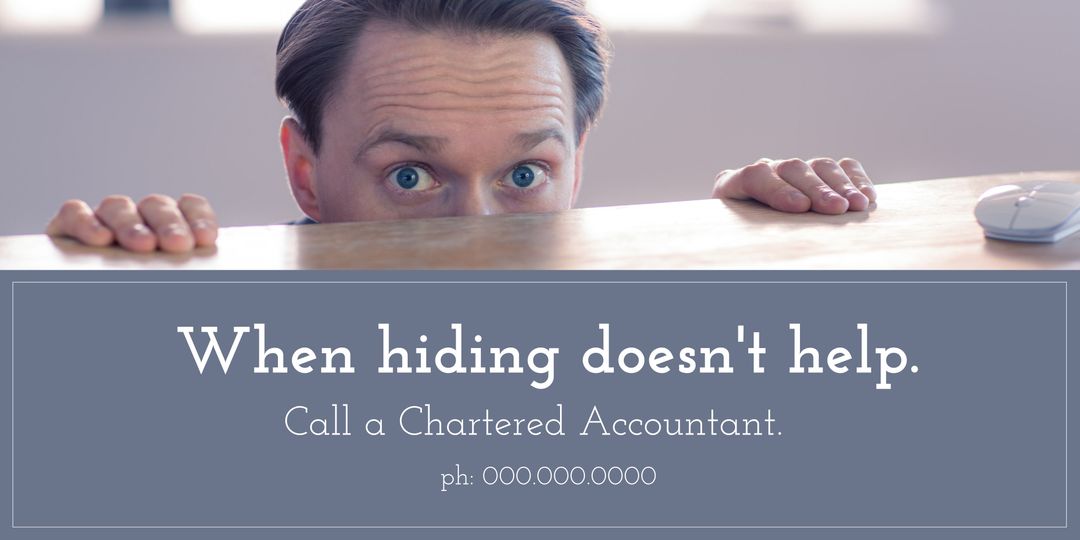 Stressed businessman peeking over desk advertising financial help