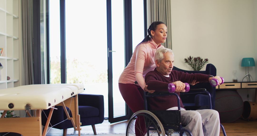 Caregiver Assisting Senior Man With Physical Therapy Exercises In Living Room - Free Images, Stock Photos and Pictures on Pikwizard.com