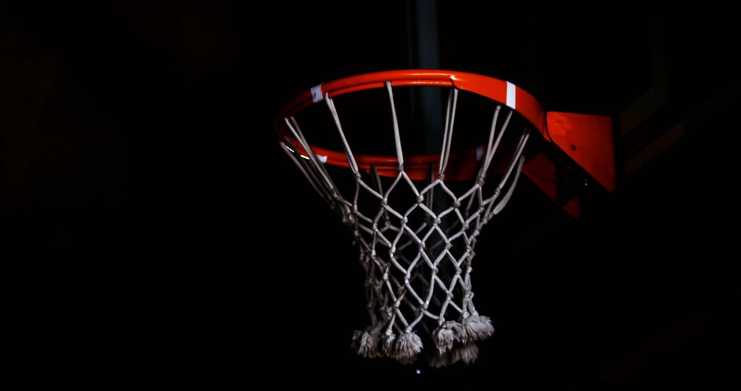 Basketball Hoop in Spotlight at Night - Free Images, Stock Photos and Pictures on Pikwizard.com