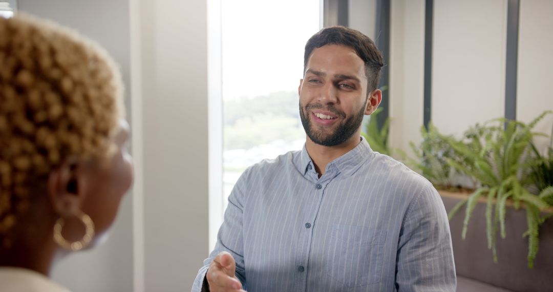 Businessman Successfully Collaborating with Colleague in Professional Setting